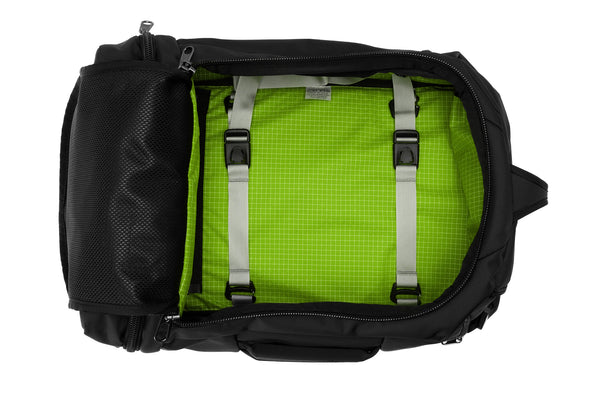An open Techonaut 30 with a Black exterior and a Kiwi (bright green) interior.